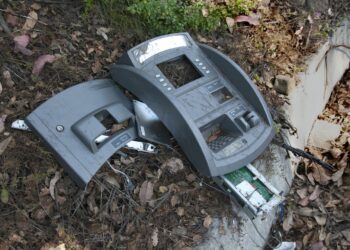 ATM broken on street curb